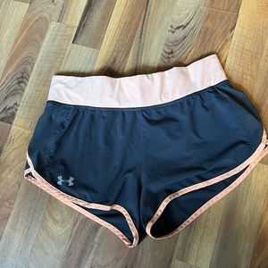 Women’s under armor running shorts- size M